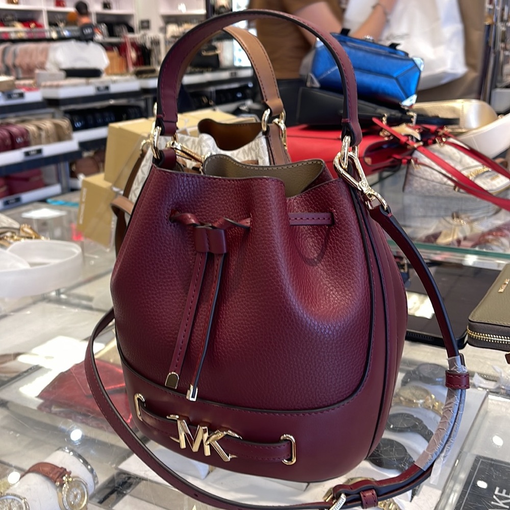 MICHAEL KORS 
Reed Medium Pebbled Leather Bucket Bag
Dark Cherry 
NWT - Picture 2 of 16